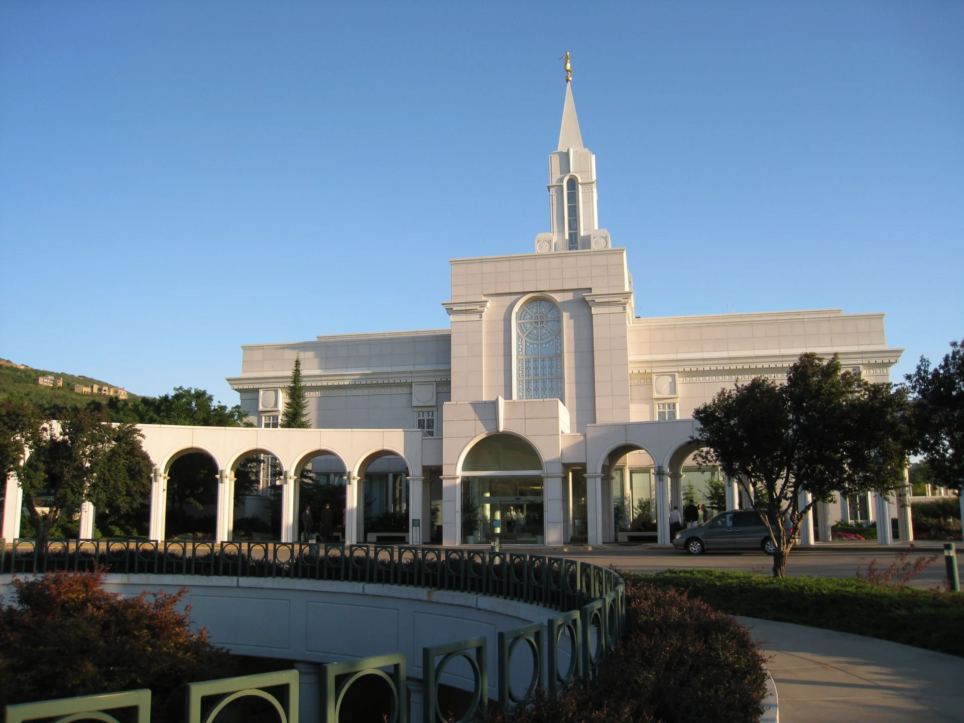 Oquirrh Mountain Temple exterior with a clear blue sky.