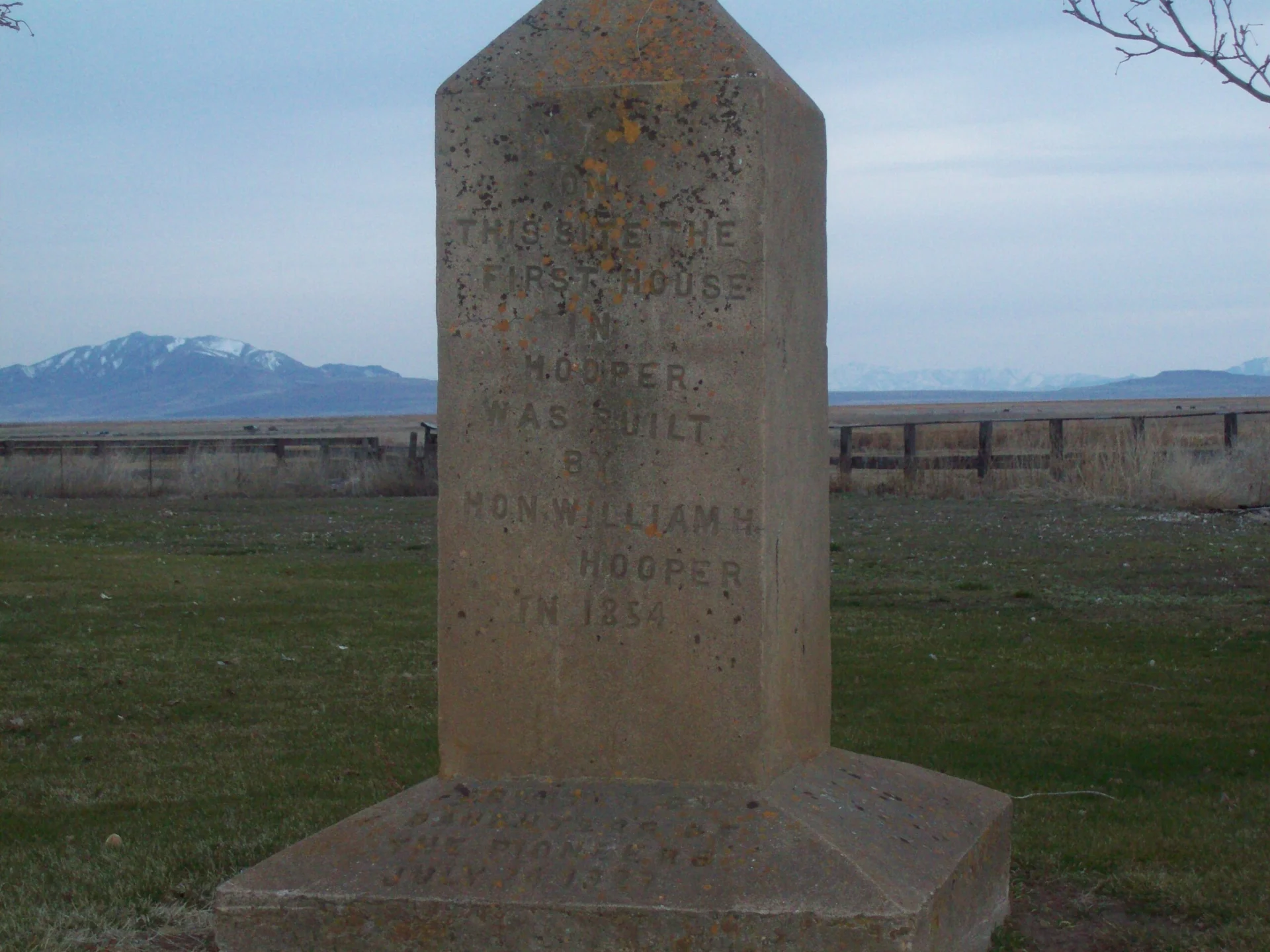 Monument marking the site of the first house in Hooper, Utah, built in 1854.